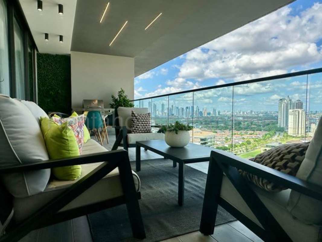 Luxury bathroom featuring marble tile, double vanity, soaking tub, and glass shower PH Empire Residences
