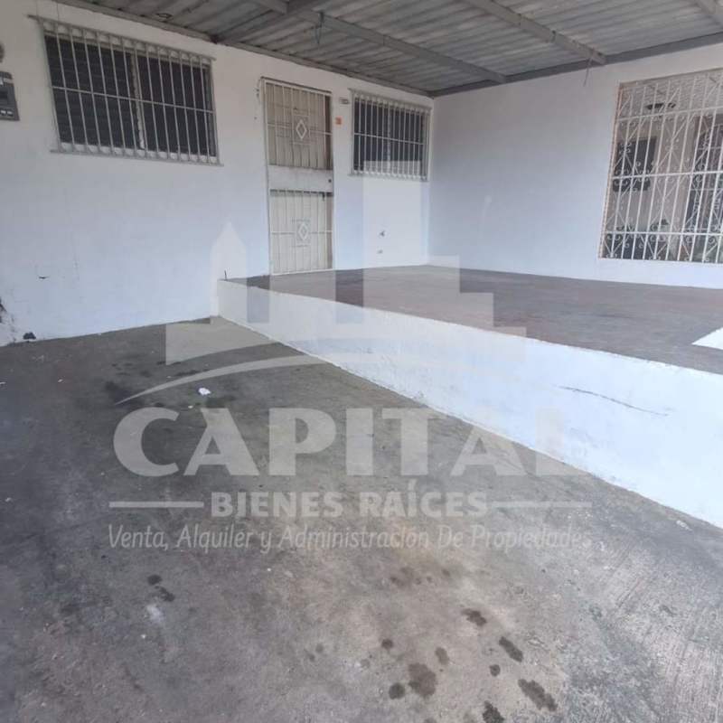 Covered front porch with security bars concrete elevation Don Bosco Panama