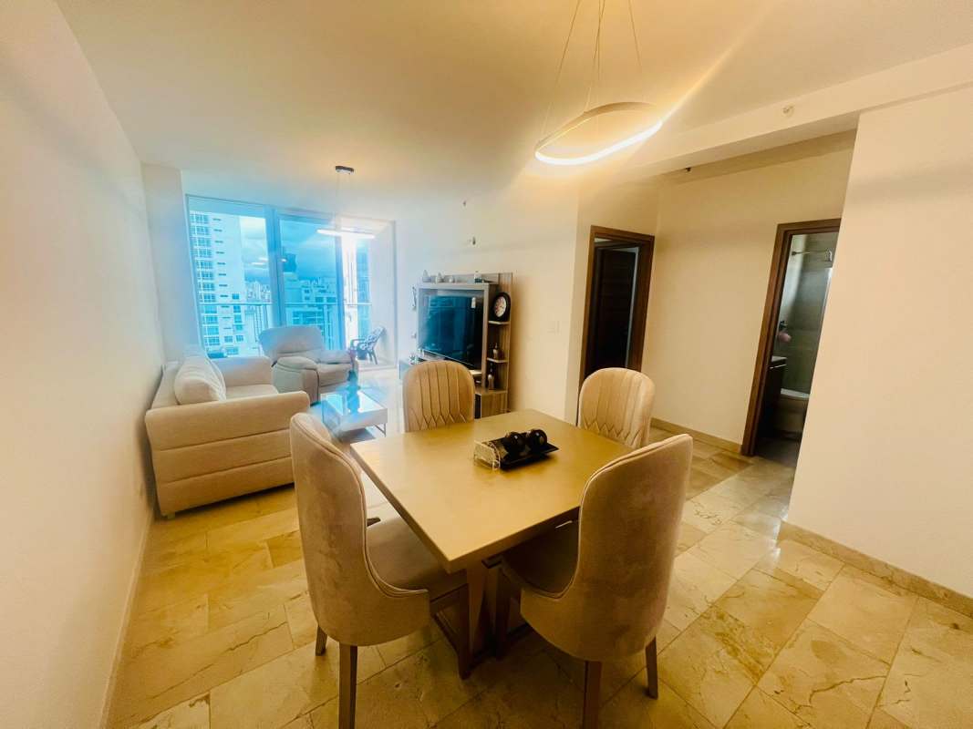 Modern living dining area with marble floors and large windows at PH Vista Tower Bella Vista Panama