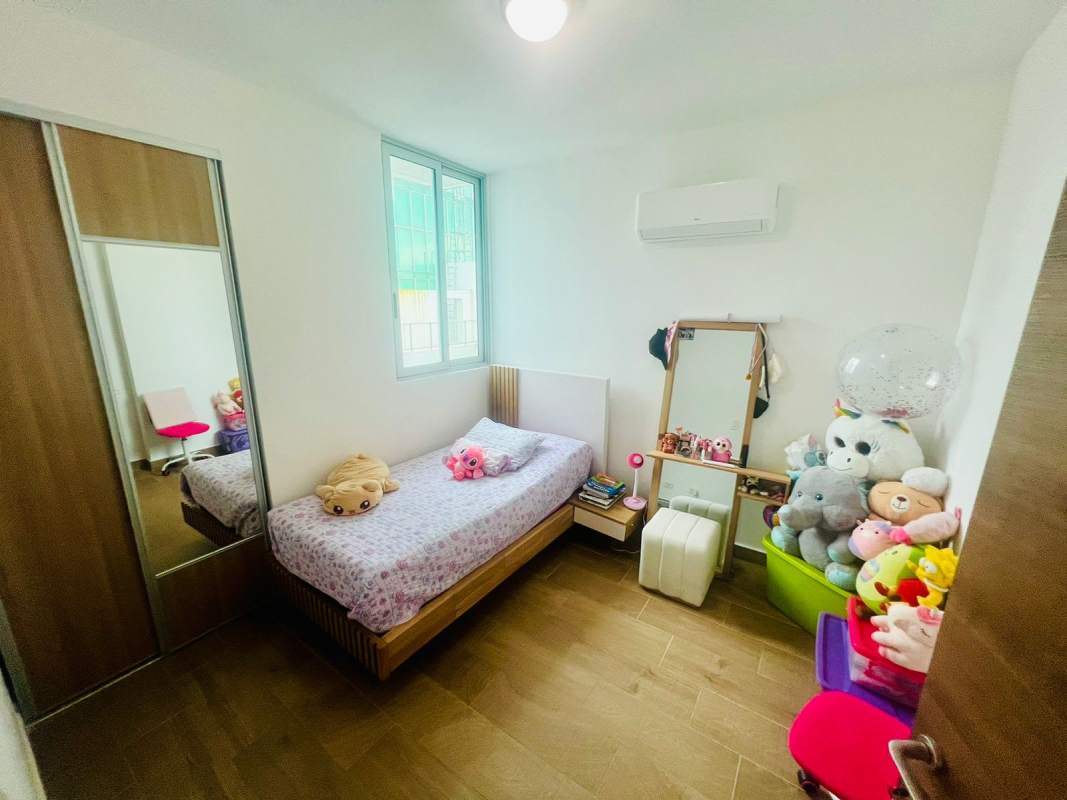 Wave patterned wooden ceiling lobby marble floors PH Vista Tower Bella Vista Panama