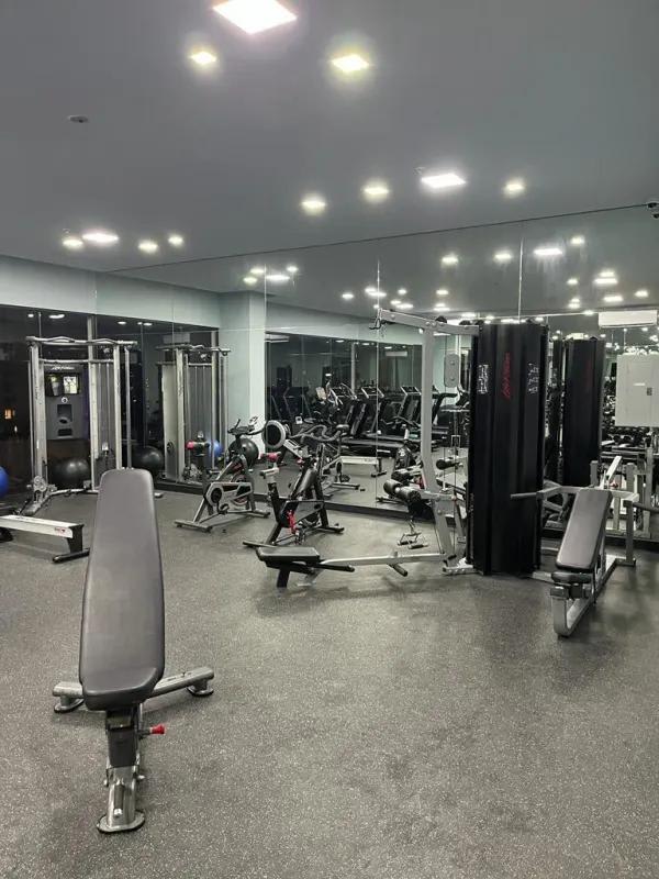 Modern gym with equipment and mirrored walls PH Coco Place Coco del Mar Panama