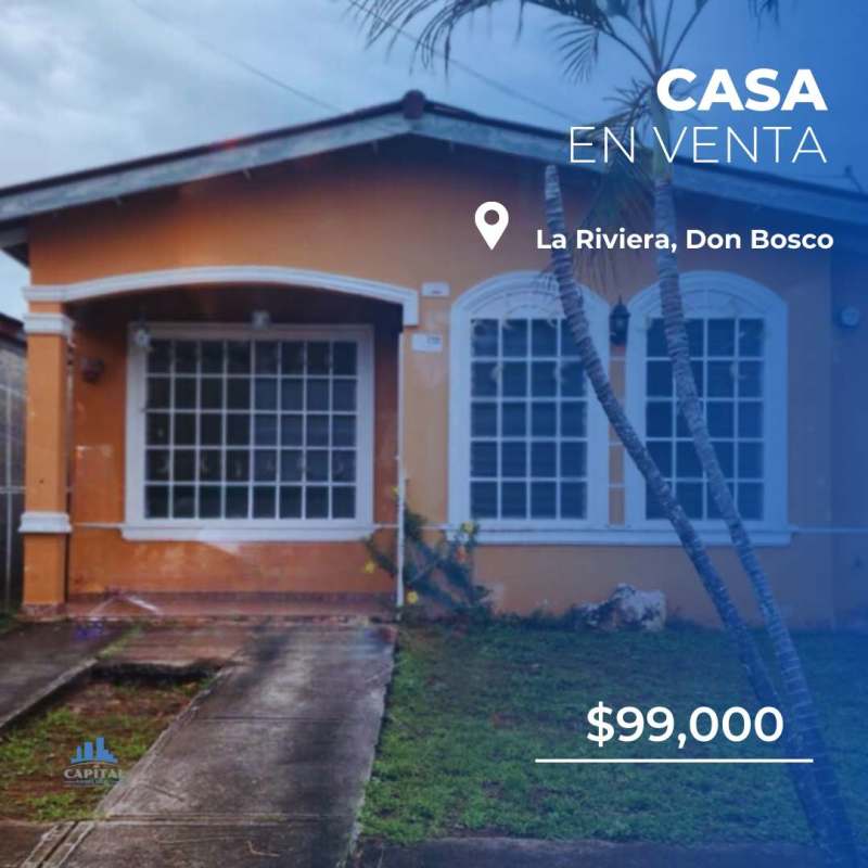 Front facade of single-story house with porch and lawn in La Riviera Don Bosco Panama City for sale