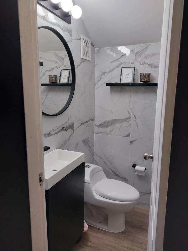 Modern living room with large windows and ceramic floors house sale Panama City