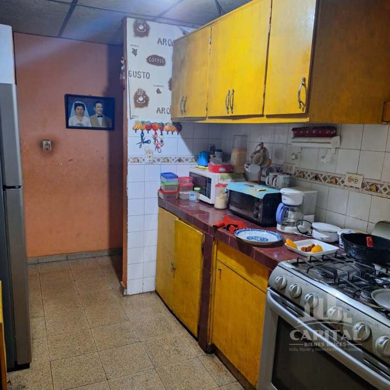 Traditional rustic kitchen with cabinets and appliances Don Bosco Panama house sale