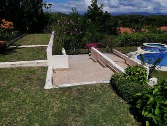 Terrace lounge garden view outdoor dining villa for sale Panama