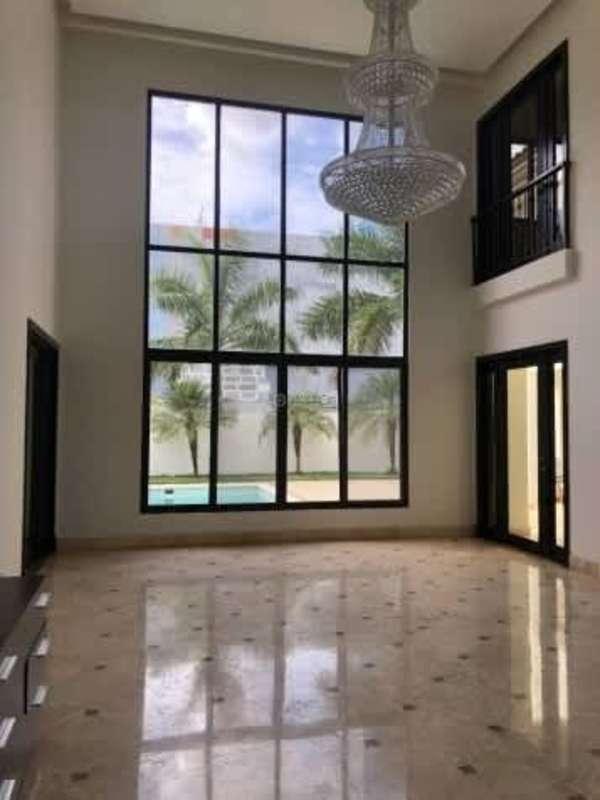 Large luxury living room with marble flooring and garden views in Costa del Este home