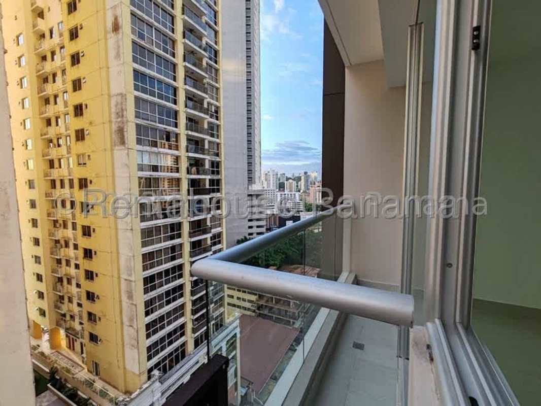Balcony with glass railing overlooking Panama City skyline PH Downtown Obarrio