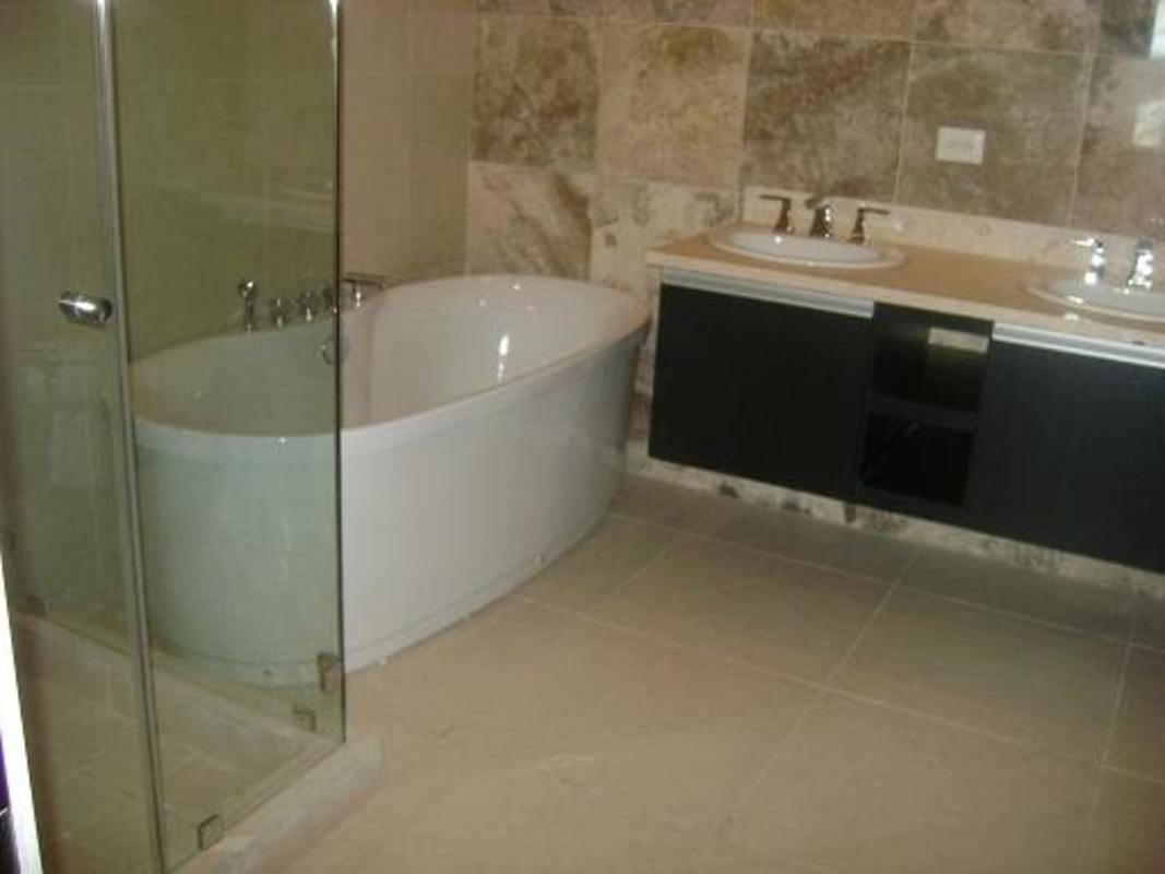 Infinity pool overlooking Pacific Ocean skyline in PH Rivage Avenida Balboa Panama City