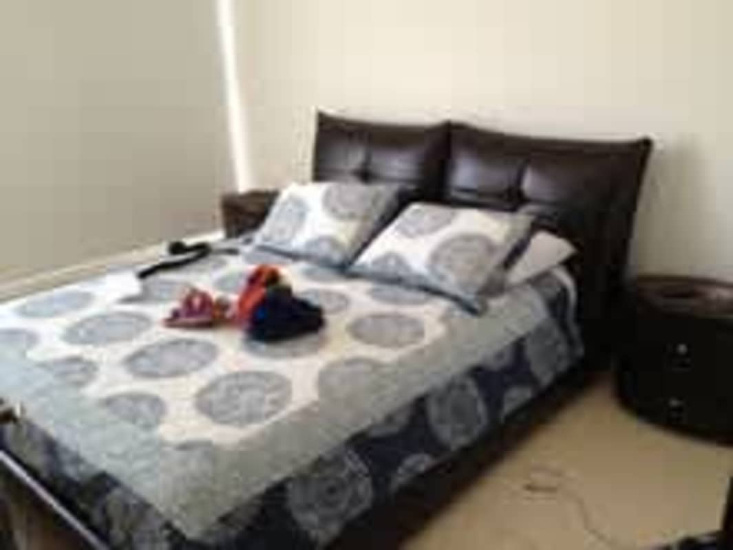 Spacious master bedroom with king bed, ocean view window, ensuite bath in PH Rivage Panama