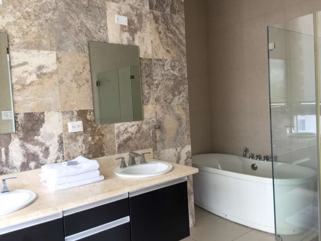 Contemporary bathroom with glass shower enclosure, modern sink in PH Rivage Avenida Balboa Panama
