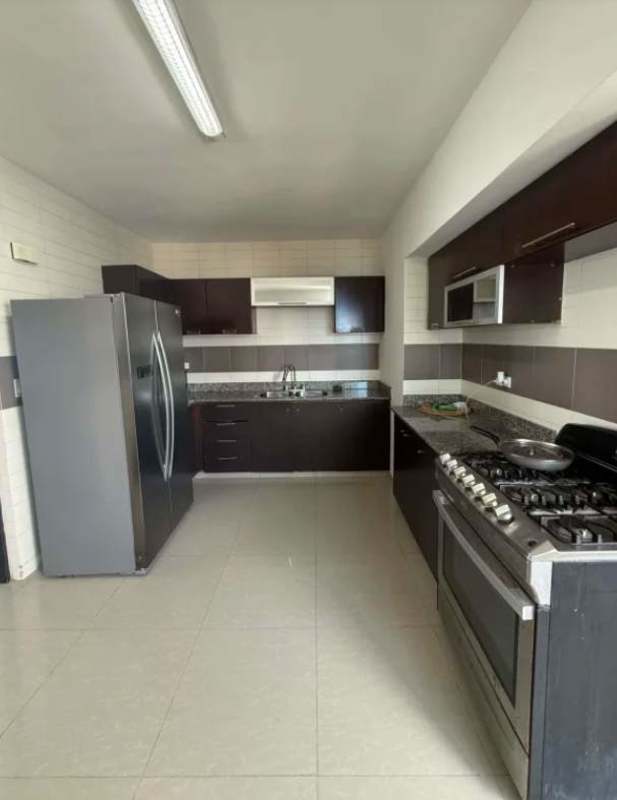 Contemporary kitchen with granite countertops PH Infinity Tower Coco del Mar Panama