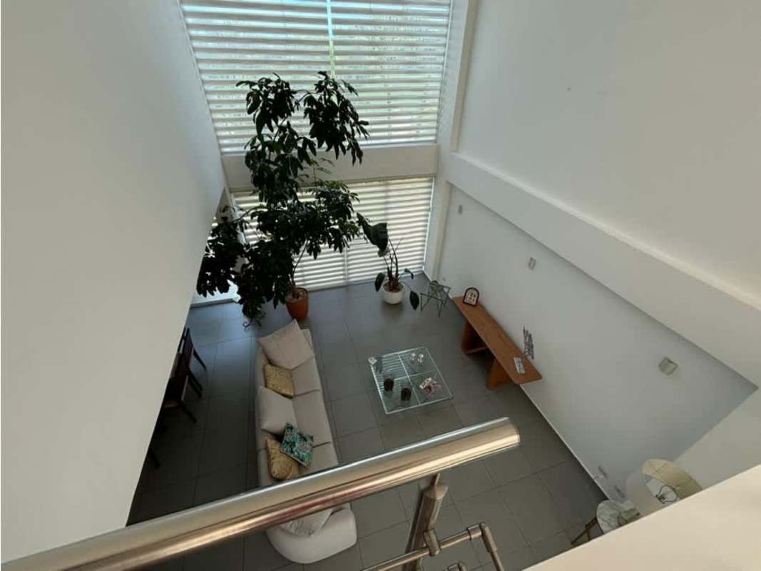 Spacious kitchen with granite island and modern appliances in luxury Costa Sur house Panama - Hola Realty