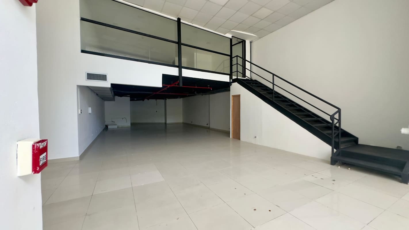Modern mezzanine office space with staircase in Bella Vista Panama rental commercial property