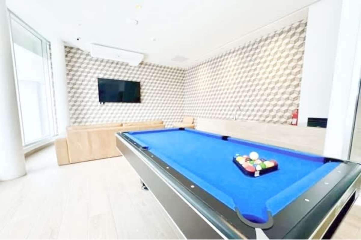 Private home theater room with leather recliners at PH Urbania Obarrio Panama