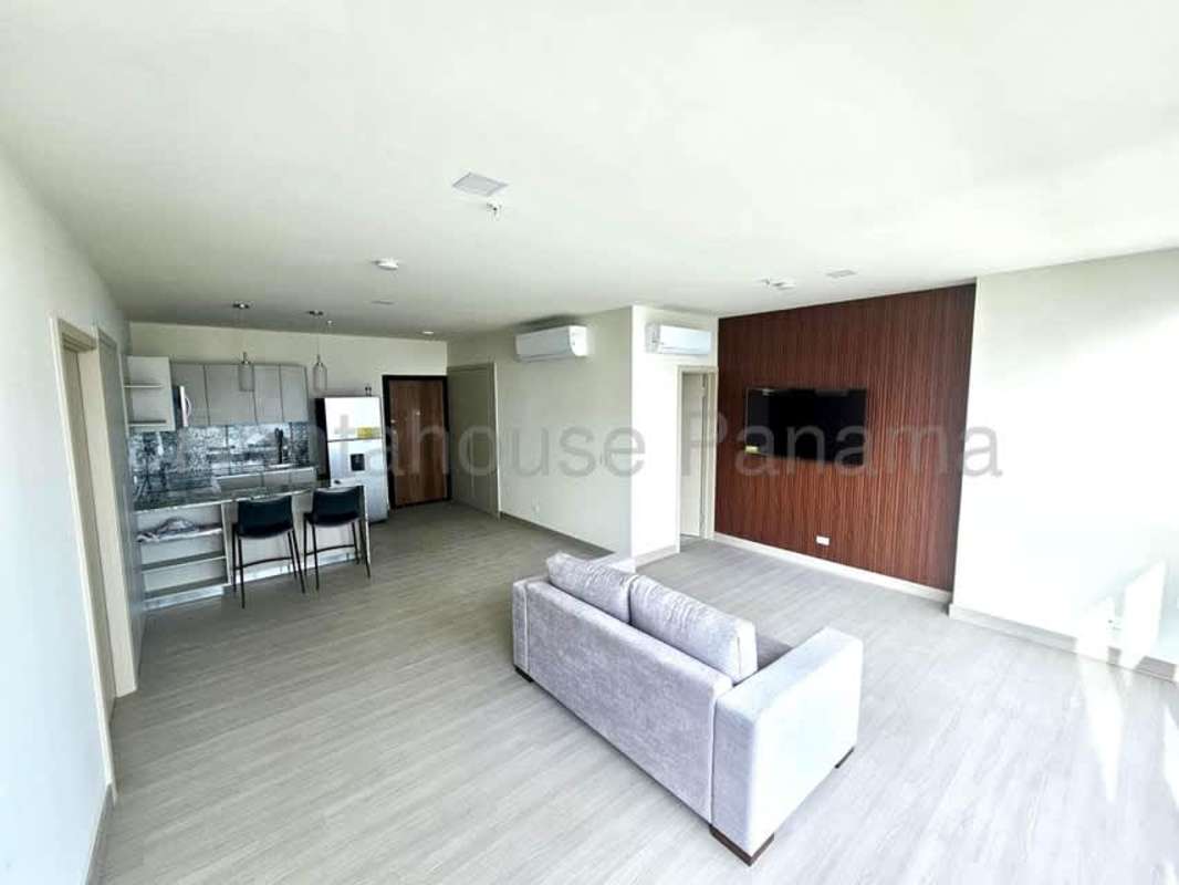 Elegant furnished master bedroom with floor-to-ceiling windows, walk-in closet, city views Costa del Este Panama