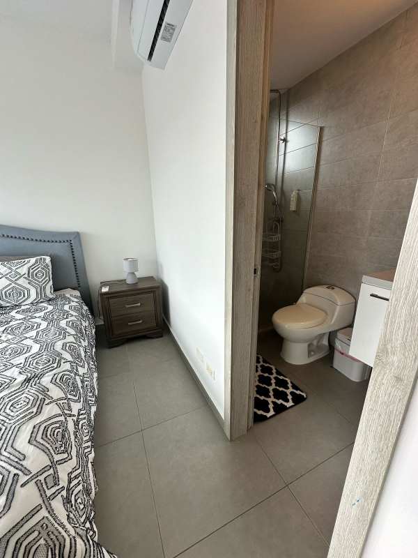Furnished bedroom with ensuite bathroom and AC at PH Vista Hermosa Bella Vista Panama