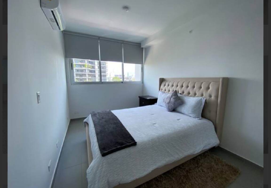 Bedroom with large window, split AC, closet, tile floors in PH Vista Hermosa Panama City
