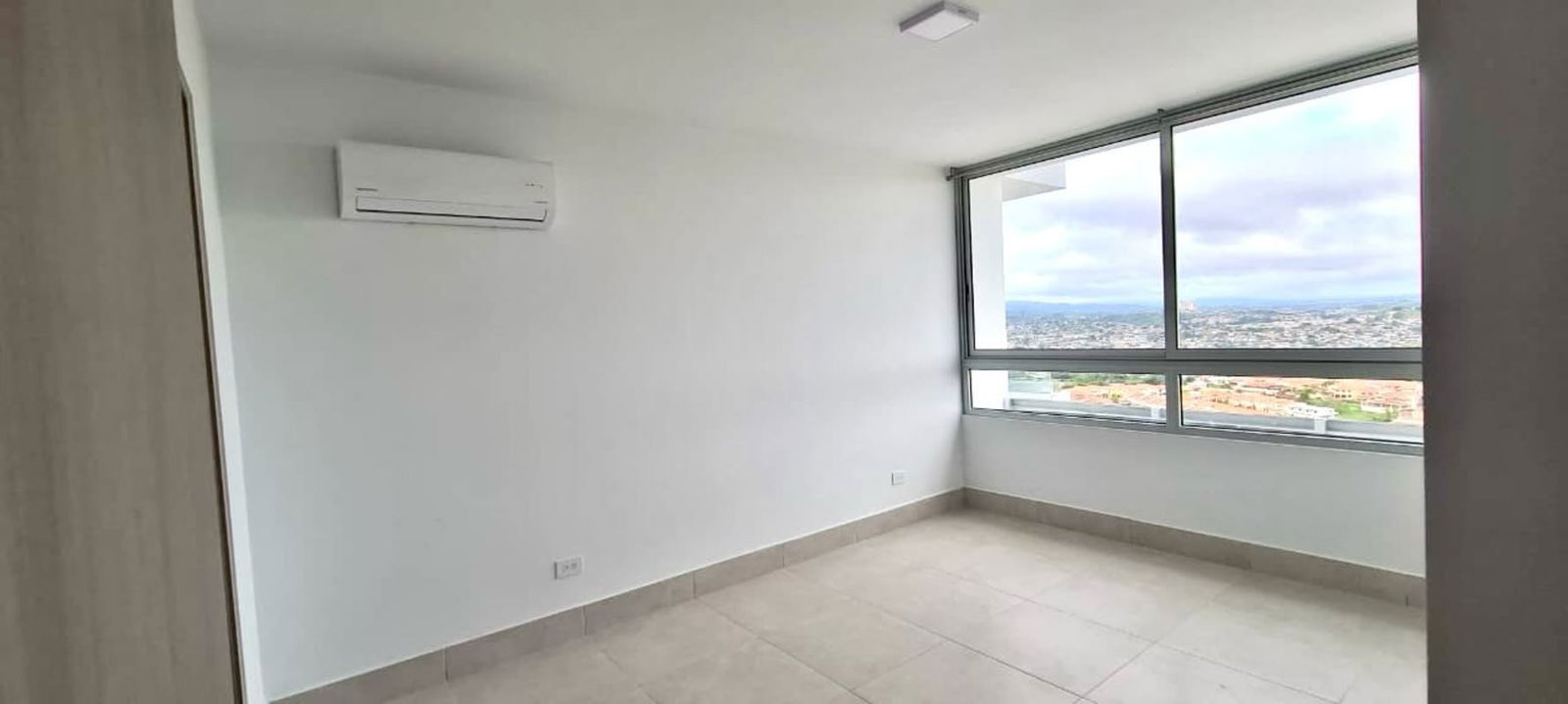 Bright bedroom with large windows and AC connection PH Greenwood Towers Condado del Rey Panama