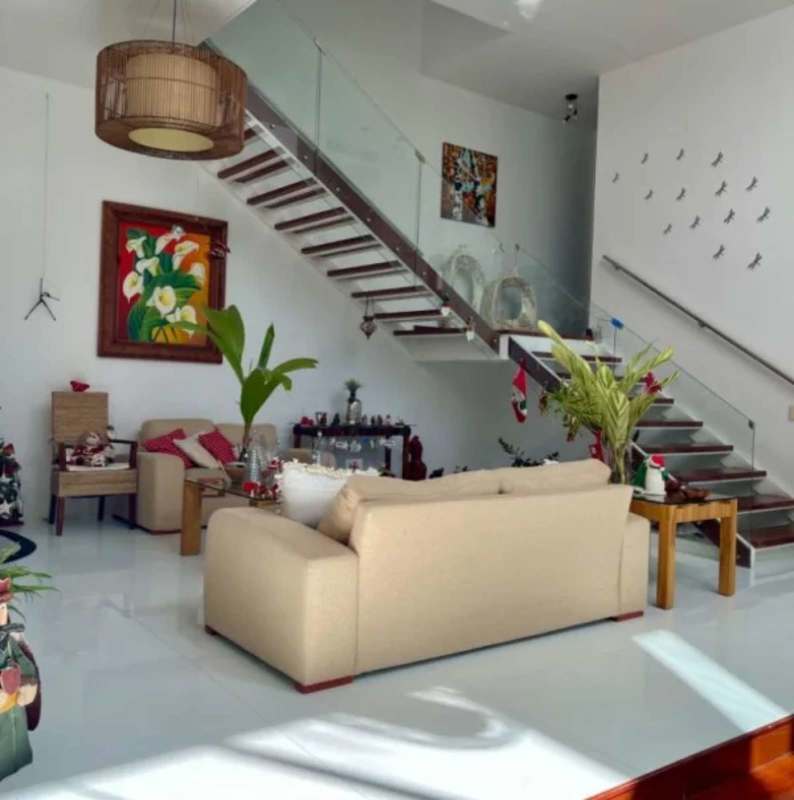 Bright living room with double ceilings and large windows Altos del Golf Panama City luxury rental