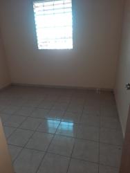 Bedroom with ceramic tile flooring window in Montelimar house for rent Panama