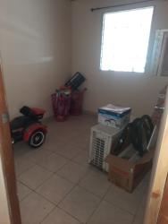 Living and dining area with ceiling fan ceramic floor Montelimar rental house Panama