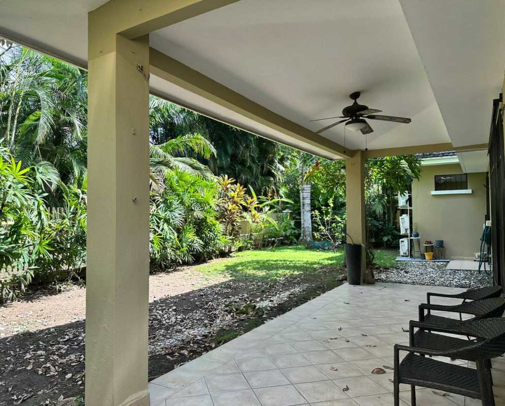 Bright entryway with frosted door and staircase inside Clayton family residence