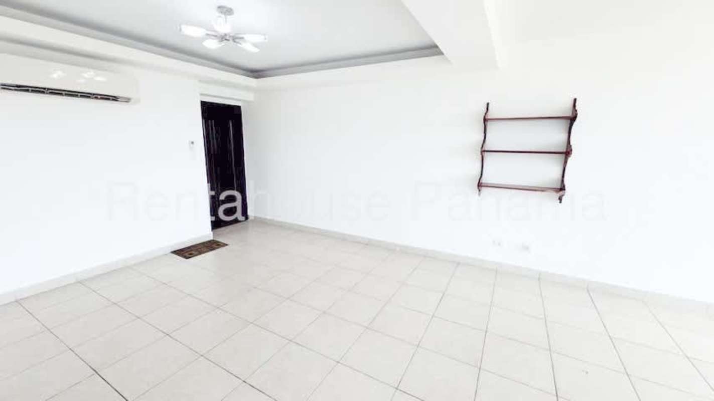 Kitchen with granite countertops, dark wood cabinetry and appliances in Clayton Panama
