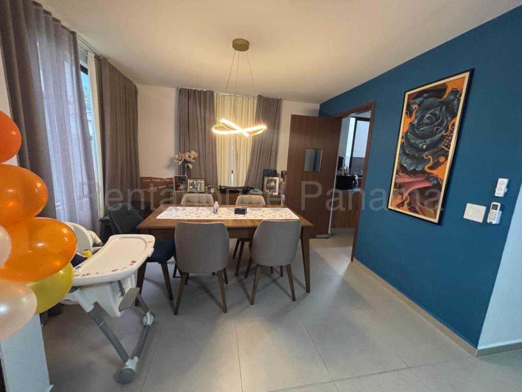 Modern bathroom with large mirror and wood vanity Golf Gardens rental home Panama