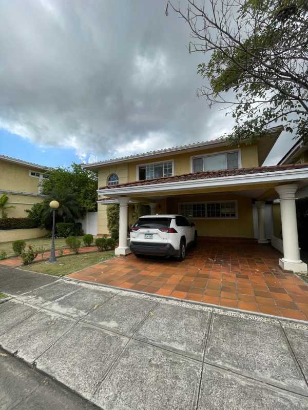 Bright dining area with chandelier and large windows in Costa Dorada luxury house Panama