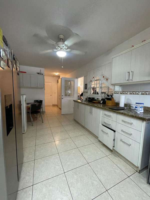 Covered terrace overlooking private garden patio luxury home Costa del Este Panama