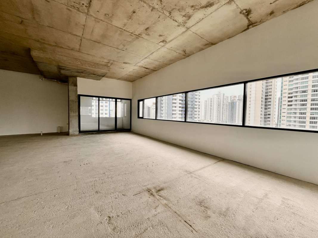 Large open space with floor-to-ceiling windows unfinished in PH Midtown Panama