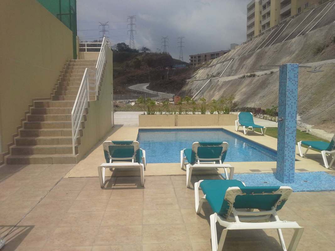 Bright living dining area with porcelain tile, large windows and balcony in Altamira Gardens near Rod Carew Stadium