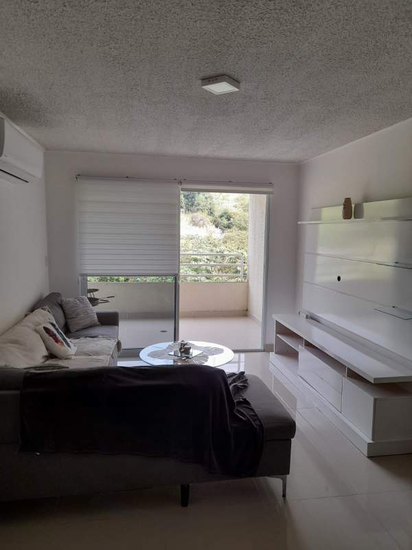 Modern condominium gym with cardio equipment, air conditioning and windows at Altamira Gardens Panama