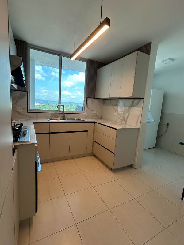 Large living dining room with balcony access, city views at PH Mont Royale El Cangrejo Panama