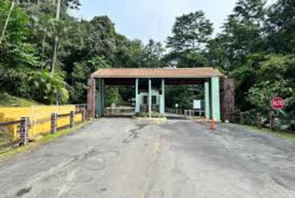 Entrance of gated residential community Los Altos de Cerro Azul with guardhouse Panama
