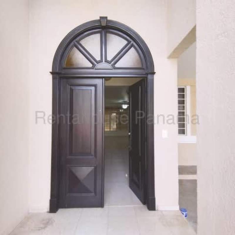 Traditional Mediterranean inspired front entrance of Costa Bella house Panama