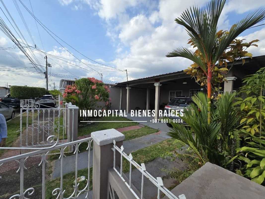 Secondary bedroom with tiled floors and security bars in Don Bosco house Panama