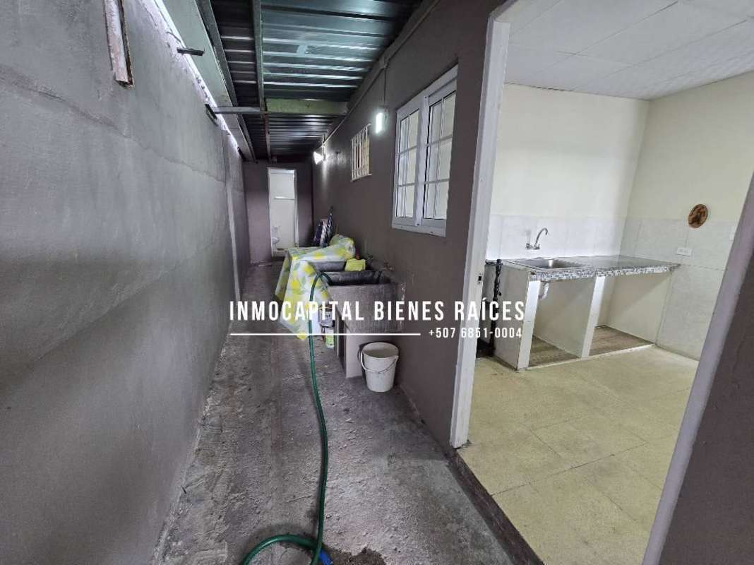 Dining area next to open kitchen in Don Bosco Panama house