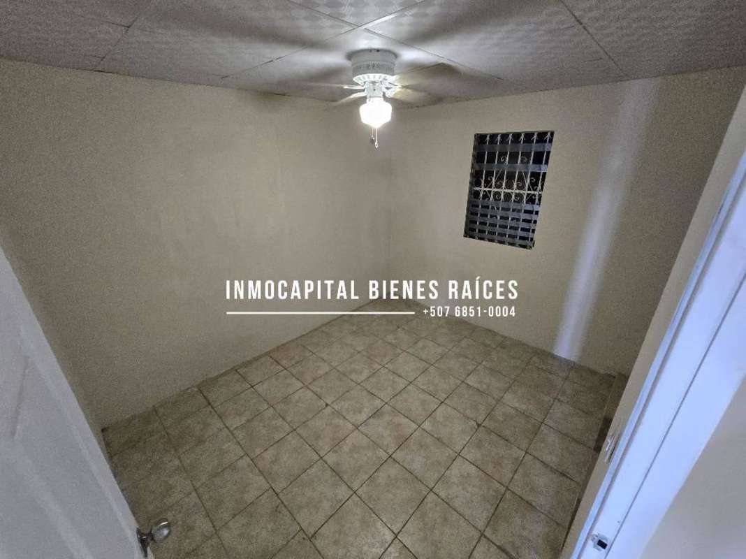 Spacious open living-dining room in Don Bosco house Panama with tiled floors