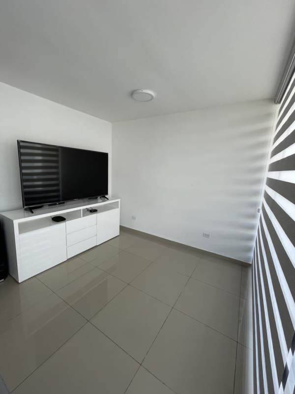 Master bedroom with built-in closet blackout shades at PH Sky Park Carrasquilla Panama