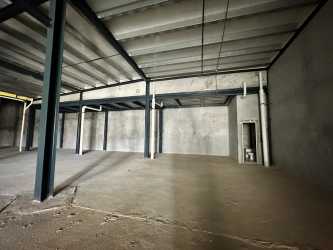 Unfinished warehouse commercial interior double height Costa Verde Plaza Panama
