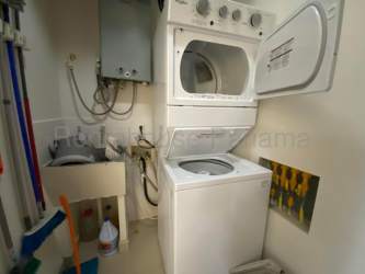 Contemporary bathroom with glass enclosed shower and modern vanity PH River Valley Panama