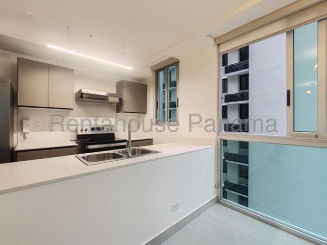 Apartment hallway with multiple doors neutral wall colors PH Urbana Obarrio Panama City