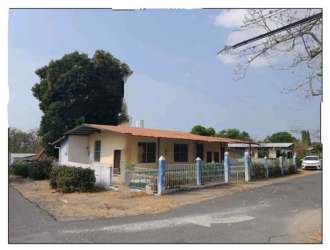 Single story corner lot beach house with fenced yard in San Carlos Panama for investment