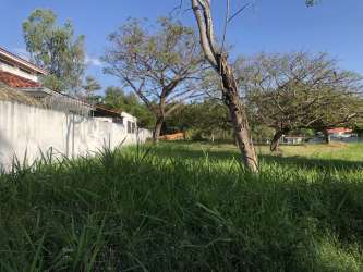 Green flat lot in a residential beach golf community in Coronado Panama