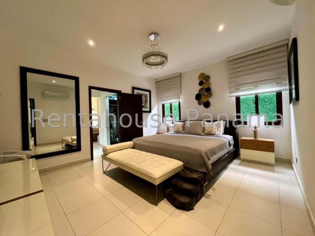 Elegant bathroom with modern vanity mirror and glass enclosed shower Sunset Coast Costa Sur Panama