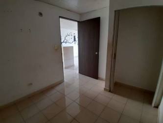 Tile floor small room or hallway with white walls dark door Princesa Mía IV Panama