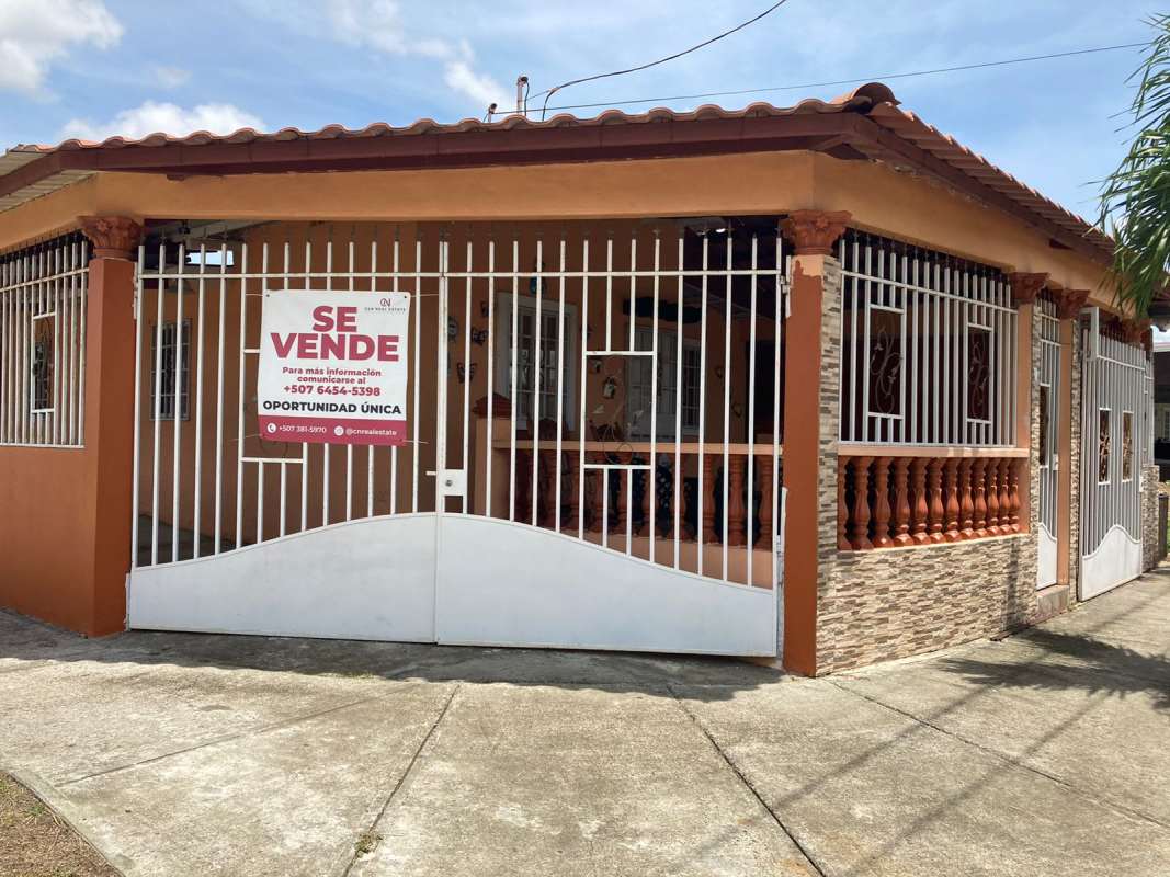 Covered patio with playhouse and swing inside corner house for sale in Pacora Panama