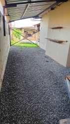 Side outdoor space with metal roofing in Villas de Costa Oeste La Chorrera Panama