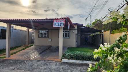 Covered parking area with tiled roof, corner house in Costa Oeste La Chorrera Panama